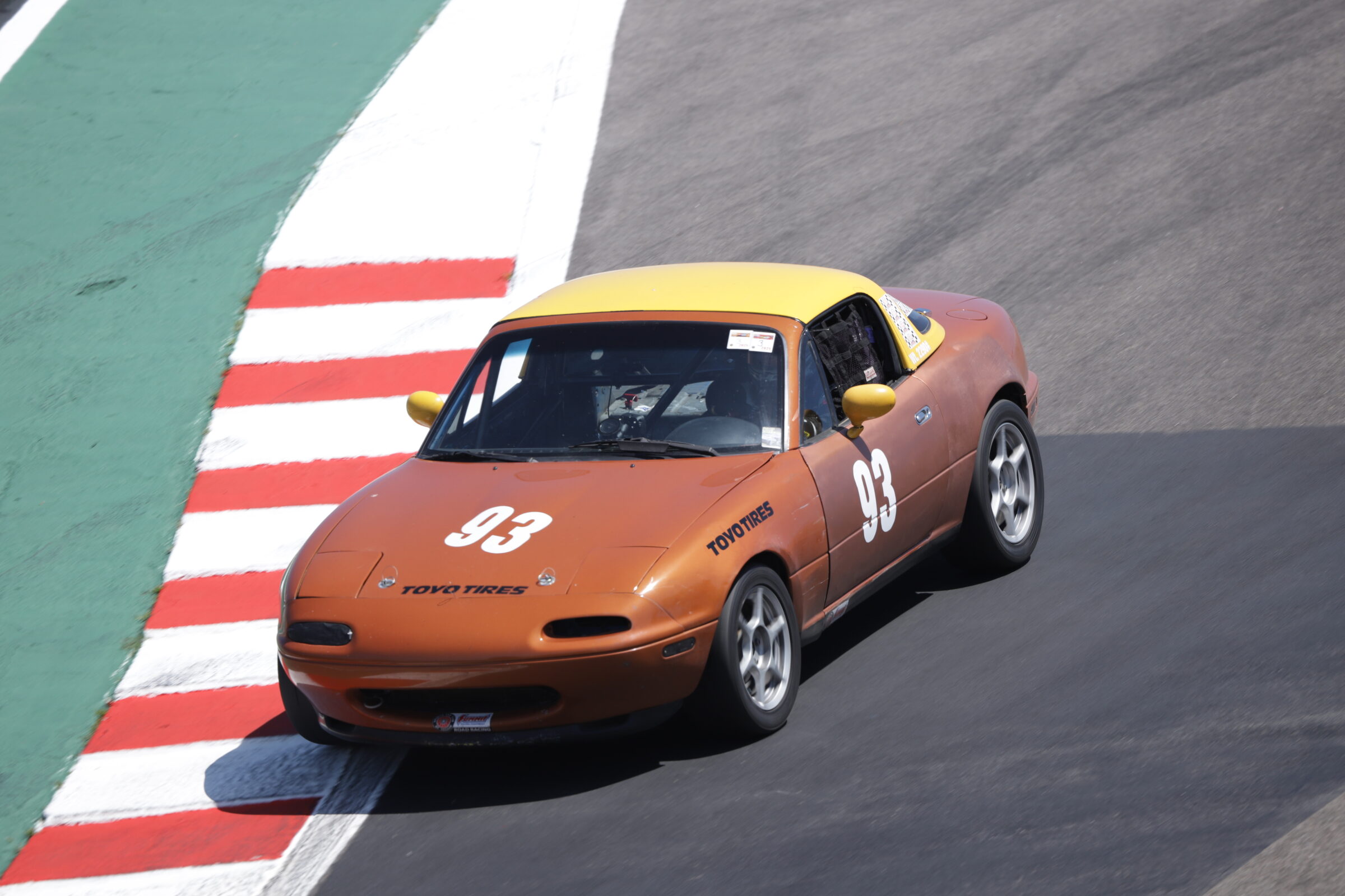 Spec Miata cornering on track